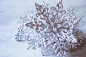 A white snowflake. Christmas descor. Christmas background. photo