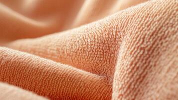 AI generated Soft, peach-colored fabric with intricate weaves, highlighting its texture and quality. photo
