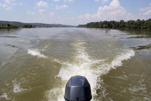 Traveling on Danube River with Motor Boat near Novi Sad in Vojvodina, Serbia. photo