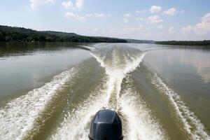 Traveling on Danube River with Motor Boat near Novi Sad in Vojvodina, Serbia. photo