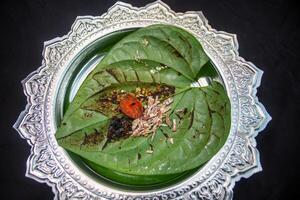 jorda indian paan masala on betel leaf top view photo