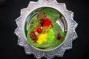 hydrabadi indian paan masala on betel leaf top view photo