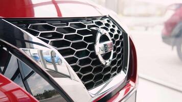 USA, NEW YORK, MARCH 19, 2022. Detailed close up view of new Nissan. Auto showroom video