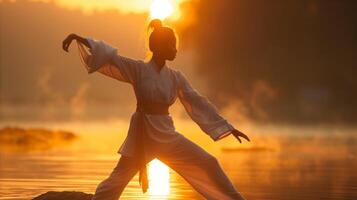 AI generated Martial artist practicing at sunrise by tranquil waters photo