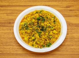 Aloo anday bhurji served in plate isolated on table top view of indian and pakistani spicy food photo