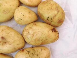 Potatoes on wooden background video