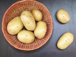 Potatoes on wooden background video