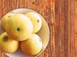 Oranges fruit on wooden background video