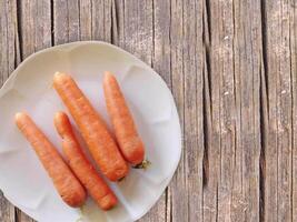 Carrots on wooden background video