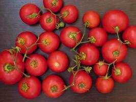 Tomatoes on wooden background video