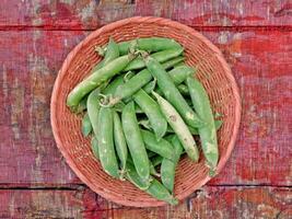 Peas on wooden background video