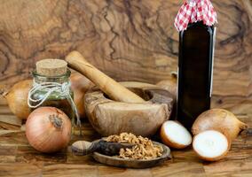 roasted onions on olive wood photo