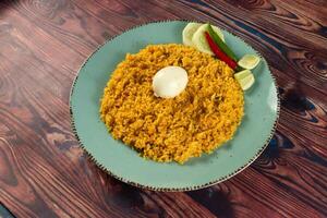 spicy Egg pulao, polao, biryani, mandi, kacchi with egg and salad served in dish isolated on table top view of indian food photo