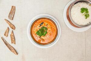 Beef handi with plain rice served in a dish isolated on table top view of indian spices food photo