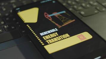 Renewable Energy Transition inscription on smartphone screen. Graphic presentation with oil and gas platform illustration. Oil and gas concept video