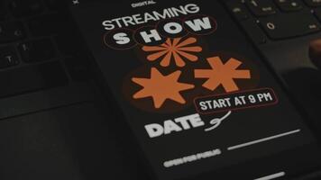 Digital streaming. Event show date dedicated to Digital streaming. Graphic presentation on smartphone screen. Male hand flapping fingers cheerfully. Entertainment concept video