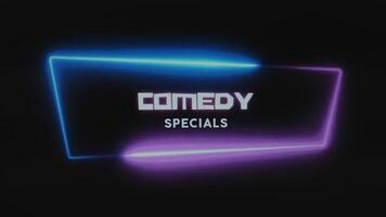 Comedy specials lighting inscription. Graphic presentation with a dynamic neon frame of pink and blue colors on black background. Entertainment concept video