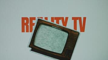 Reality TV inscription on grey background with image of a jumping vintage TV set, VHS effect on TV. Graphic presentation. Entertainment concept video