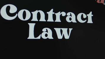 Contract Law inscription on black background, graphic presentation. Legal concept video