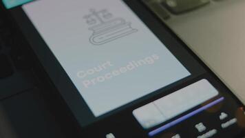Court Proceedings inscription on smartphone screen. Graphic presentation on light blue background with Scales as symbol of Judicial System. Legal concept video