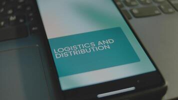 Logistics and Distribution inscription on smartphone screen. Graphic presentation with moving colored ovals on background. Manufacturing concept video
