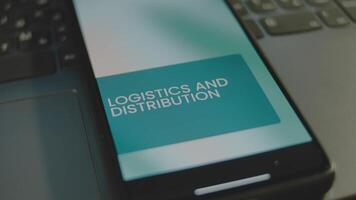 Logistics and Distribution inscription on smartphone screen. Graphic presentation with moving colored ovals on background. Manufacturing concept video