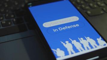 Cybersecurity in Defense inscription on smartphone screen with blue background, words in frames. Graphic presentation with silhouettes of soldiers with military equipment. Military concept video