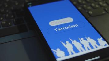 Counterterrorism inscription on smartphone screen with blue background. Graphic presentation with silhouettes of soldiers with guns. Military concept video
