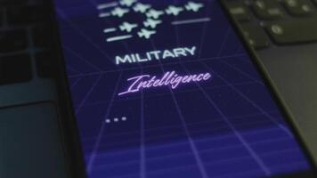 Military Intelligence inscription on smartphone screen with dark blue background with linear perspective. Graphic presentation with military aircrafts with smoke trails. Military concept. Light rays video