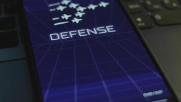 Defense Budget inscription on smartphone screen with dark blue background with linear perspective. Graphic presentation with flying military planes with smoke trails. Military concept. Light rays video