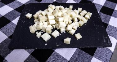 Pieces of cheese in a market photo