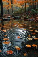 ai generado ondas en un sereno estanque superficie tocado por que cae otoño hojas foto