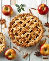 AI generated Top view of an Apple Pies on white wooden background photo