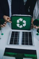 Carbon offset price report CO2 emission. Future growth Net zero waste in ESG ethical SME office protect climate change global warming social issues project. Group of asia people Eco friendly SDGs plan photo