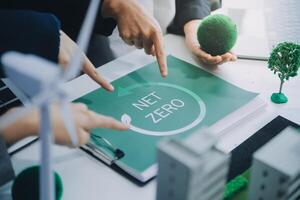 Carbon offset price report CO2 emission. Future growth Net zero waste in ESG ethical SME office protect climate change global warming social issues project. Group of asia people Eco friendly SDGs plan photo