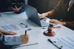 Businessman and lawyer discuss the contract document. Treaty of the law. Sign a contract business. photo