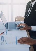 Business team collaboration discussing working analyzing with financial data and marketing growth report graph in team, presentation and brainstorming to strategy planning making profit of company. photo