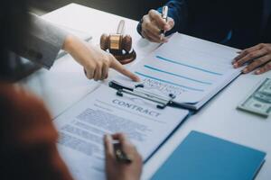 Businessman and lawyer discuss the contract document. Treaty of the law. Sign a contract business. photo