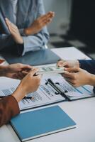 Businessman and lawyer discuss the contract document. Treaty of the law. Sign a contract business. photo