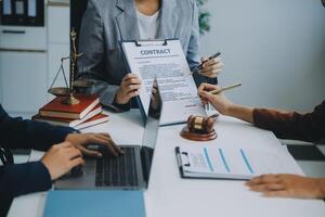 Businessman and lawyer discuss the contract document. Treaty of the law. Sign a contract business. photo