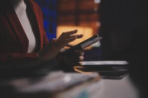 Business woman using calculator for do math finance on wooden desk in office and business working background, tax, accounting, statistics and analytic research concept photo