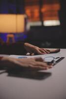 Business woman using calculator for do math finance on wooden desk in office and business working background, tax, accounting, statistics and analytic research concept photo