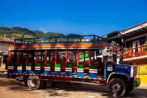 Colorful traditional rural bus from Colombia called chiva photo