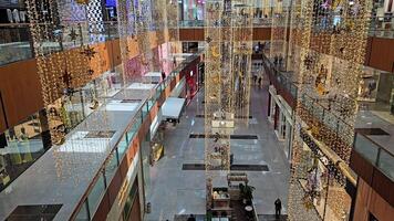 UAE, Dubai - United Arab Emirates 01 April 2024 Time lapse Spacious Interior of Dubai Mall, Shoppers and visitors inside the vast expanse of Dubai Mall. video