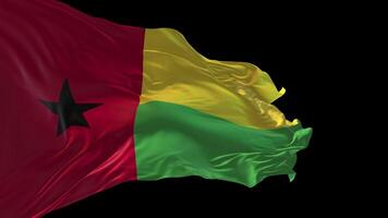 3d animation de le nationale drapeau de Guinée biisa agitant dans le vent. video