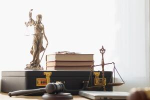 statue of god Themis Lady Justice is used as symbol of justice within law firm demonstrate truthfulness of facts and power to judge without prejudice. hemis Lady Justice symbol of honesty and justice. photo