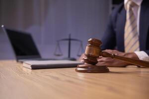 A judge gavel is prepared in the courtroom to be used to give a signal when the verdict is read after the trial is completed. Concept judge gavel is prepared to symbolize the decision in a court case. photo