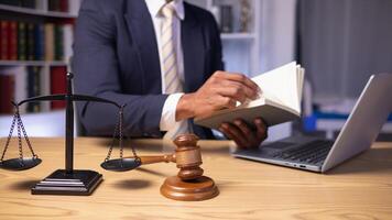 A judge gavel is prepared in the courtroom to be used to give a signal when the verdict is read after the trial is completed. Concept judge gavel is prepared to symbolize the decision in a court case. photo