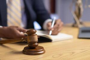 A judge gavel is prepared in the courtroom to be used to give a signal when the verdict is read after the trial is completed. Concept judge gavel is prepared to symbolize the decision in a court case. photo