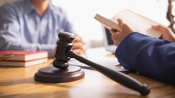 A judge gavel is prepared in the courtroom to be used to give a signal when the verdict is read after the trial is completed. Concept judge gavel is prepared to symbolize the decision in a court case. photo